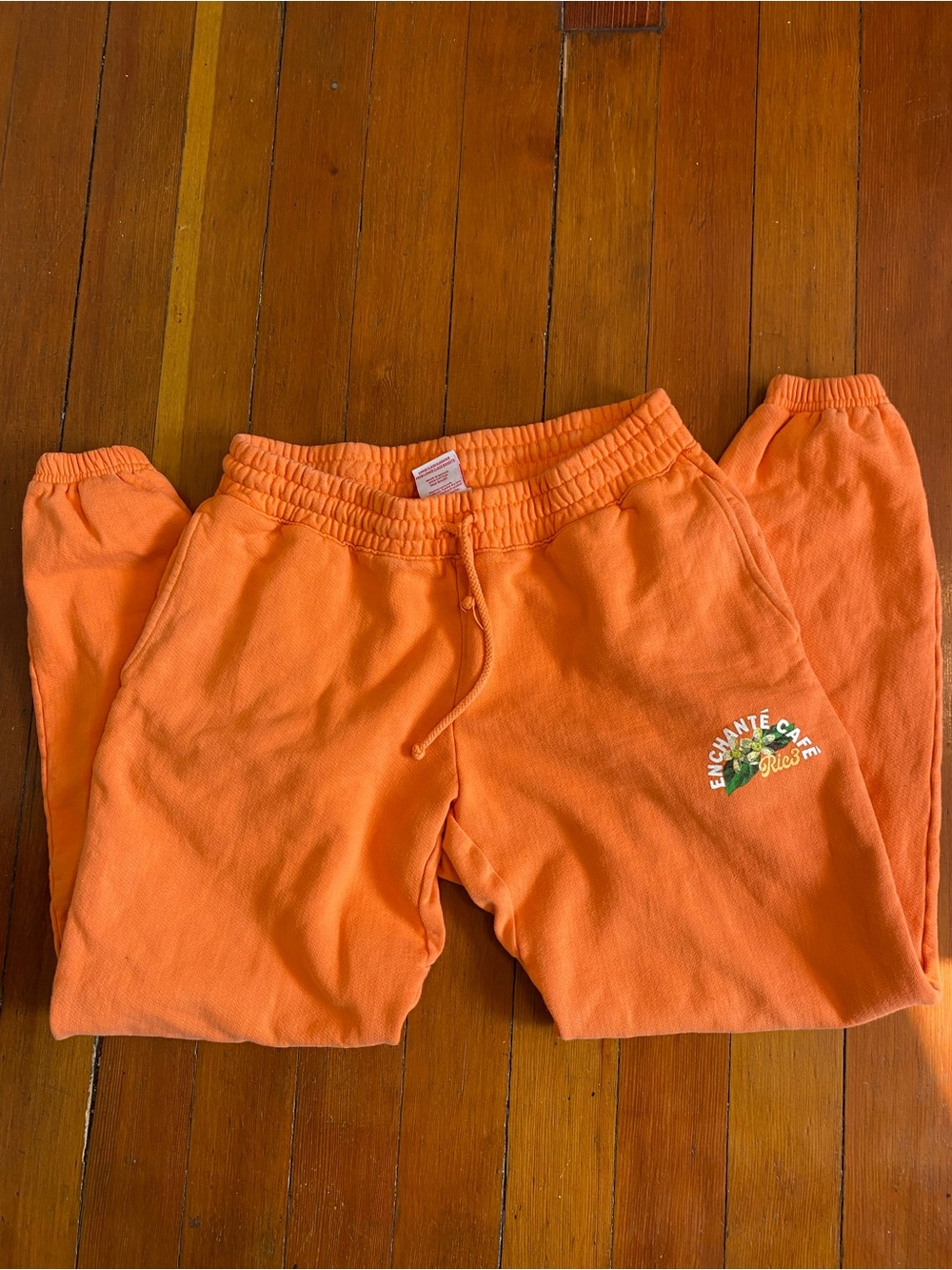 Title: Daniel Ricciardo RIC3 Enchanté Cafe Orange Sweatpants - L